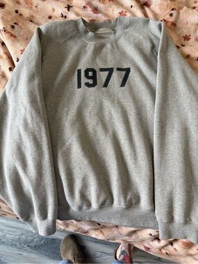 Fear of God Essentials Gray Crewneck Sweatshirt with '1977' Graphic